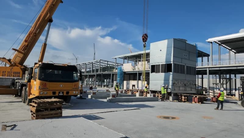 A team from Superior Machinery conducting a heavy machinery moving operation at the YTL Data Center.